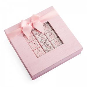 Pink candy paper box with ribbon